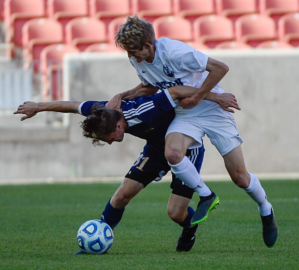 Francisco Kjolseth | The Salt Lake Tribune
Herriman's Isaac Chance is shoved by Layton's Garrett Boston during the 5A boys' state soccer championship  at Rio Tinto Stadium, Thursday, May 25, 2017. Layton took in the title in shootout 5-3.
