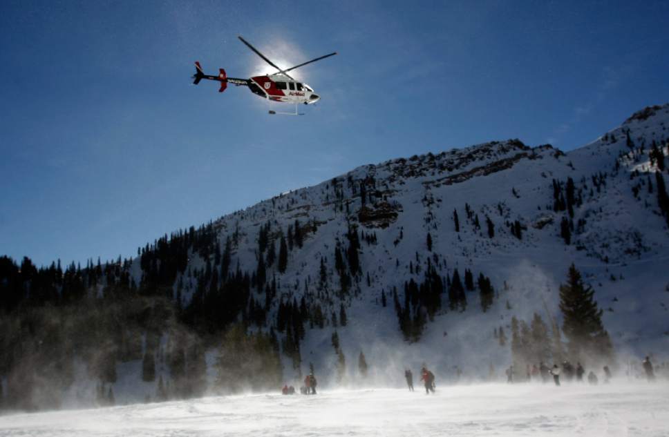 Rick Egan   |  The Salt Lake Tribune

An AirMed helicopter stirs up the snow as it searches for a signal from a beacon, in Mineral Basin at Snowbird Ski Resort.  Wasatch Backcountry Rescue (WBR), University of Utah Health Care's AirMed and the Salt Lake County Sheriff's conducted a backcountry rescue training at Snowbird,Friday, January 8, 2010 Members of the Snowbird Ski Patrol, WBR and AirMed used long-range receivers (beacon locator equipment) in a simulated avalanche rescue, with the assistance of Snowbird avalanche rescue dogs.