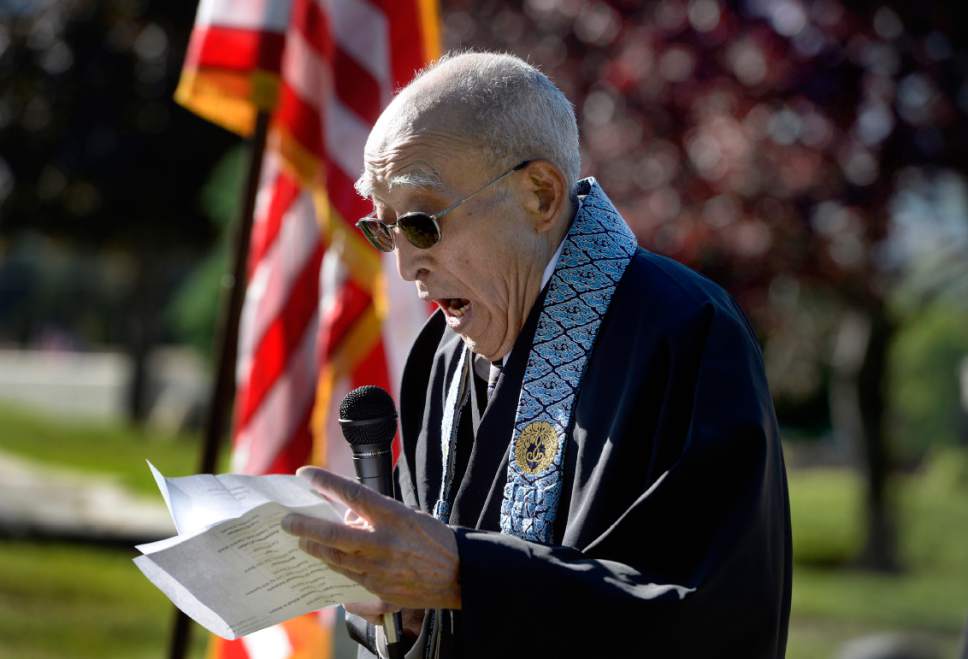 Scott Sommerdorf | The Salt Lake Tribune
The Rev. Masami Hayashi of the Salt Lake Buddhist Temple chants Sunday during a ceremony honoring Japanese-American servicemen killed in WWII.  The Utah Chapters of the Japanese American Citizen League on Sunday commemorated the sacrifices and honored the services of all Japanese-American veterans who have died.
