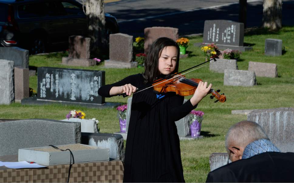 Scott Sommerdorf | The Salt Lake Tribune
Hannah Christensen plays violin Sunday during a service honoring Japanese-American servicemen killed in World War II. The Utah Chapters of the Japanese American Citizen League on Sunday commemorated the sacrifices and honored the services of all Japanese-American veterans who have died.
