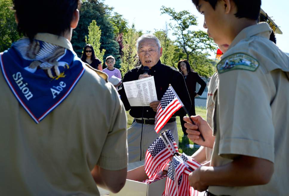 Scott Sommerdorf | The Salt Lake Tribune
Raymond Uno reads from the list of names of Utah Japanese-American servicemen killed in WWII. The Utah Chapters of the Japanese American Citizen League commemorated the sacrifices, and honored the services of all Japanese American veterans who have passed on, Sunday, May 28, 2017.