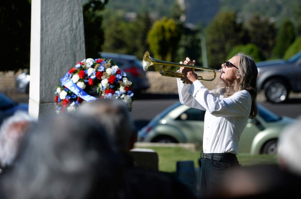 Scott Sommerdorf | The Salt Lake Tribune
Carol Huston plays taps Sunday at the end of a service honoring Japanese-American servicemen killed in World War II. The Utah Chapters of the Japanese American Citizen League on Sunday commemorated the sacrifices and honored the services of all Japanese-American veterans who have died.