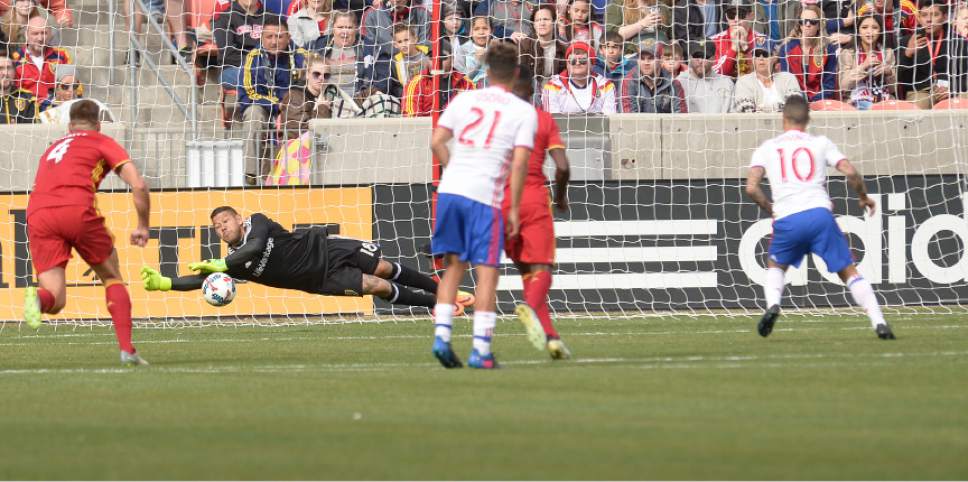 Leah Hogsten  |  The Salt Lake Tribune
Real Salt Lake goalkeeper Nick Rimando (18) makes the catch on a penalty kick by Toronto FC forward Sebastian Giovinco (10). Real Salt Lake kicked off the 2017 season Saturday, March 4, 2017 with a home opener against Toronto FC at Rio Tinto Stadium. Real Salt Lake and Toronto FC are 0-0 at the half.