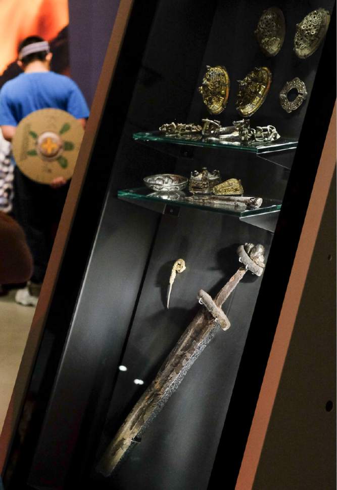 Francisco Kjolseth | The Salt Lake Tribune
Museum members get the first glimpse of  "Vikings: Beyond the Legend," a new exhibit at the Natural History Museum of Utah that opens to the public on Saturday and runs through Jan 1. Some 500 artifacts, some of which have never been shown outside Scandinavia are on display.