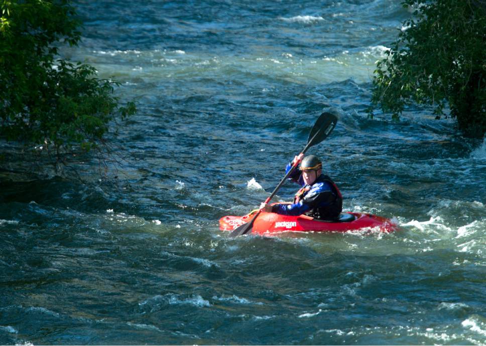 Rick Egan  |  The Salt Lake Tribune

A volunteer in a kayack looks for a 4-year-old girl who was swept down the Provo River near the mouth of Provo Canyon, Monday, May 29, 2017.