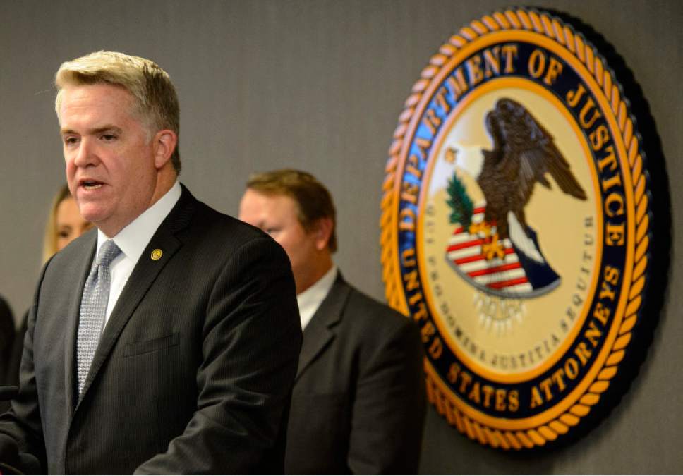 Steve Griffin  |  The Salt Lake Tribune



U.S Attorney John Huber announces a federal grand jury indictment charging six people involved with an international drug trafficking organization involved in manufacturing fake prescription drugs made form Fentanyl. The announcement was made from the U.S. Attorney's office in Salt Lake City Wednesday May 31, 2017. Huber was joined by members from the DEA, Homeland Security, IRS, FDA and the U.S. Postal Service.