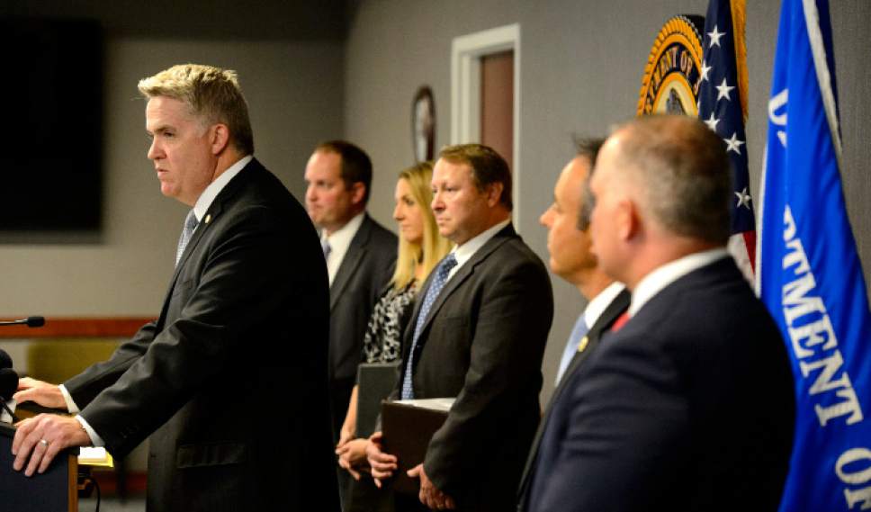 Steve Griffin  |  The Salt Lake Tribune



U.S Attorney John Huber announces a federal grand jury indictment charging six people involved with an international drug trafficking organization involved in manufacturing fake prescription drugs made form Fentanyl. The announcement was made from the U.S. Attorney's office in Salt Lake City Wednesday May 31, 2017. Huber was joined by members from the DEA, Homeland Security, IRS, FDA and the U.S. Postal Service.