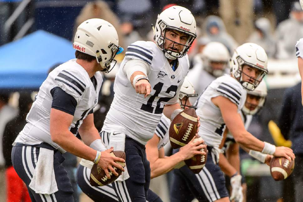 Trent Nelson  |  The Salt Lake Tribune
BYU quarterbacks Jeremiah Evans, Tanner Mangum, and Koy Detmer Jr., during the annual spring football scrimmage in Provo, Saturday March 25, 2017.