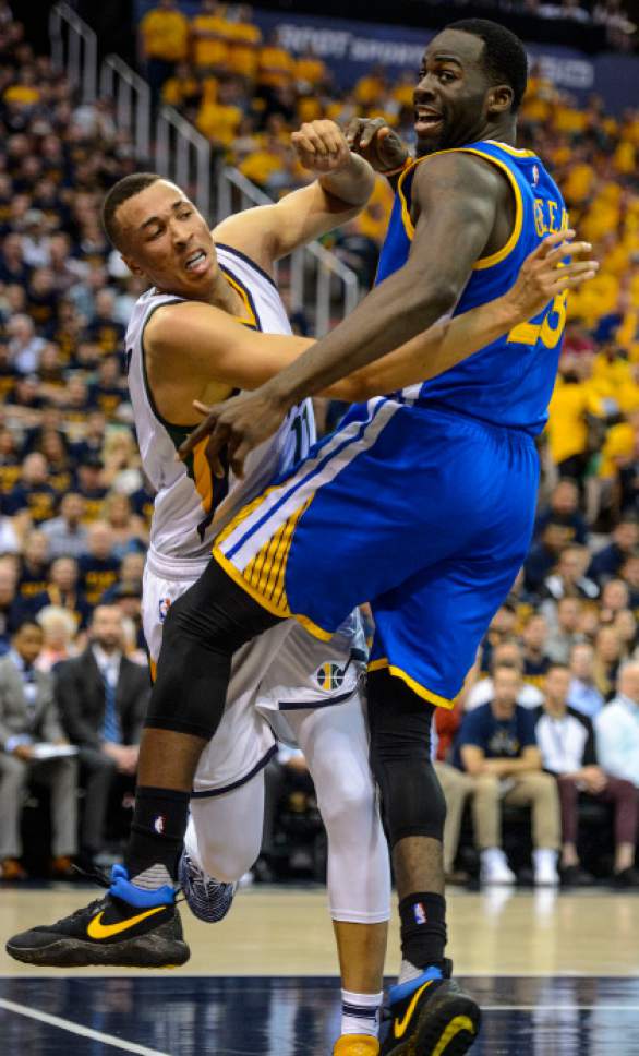 Steve Griffin  |  The Salt Lake Tribune


Utah Jazz guard Dante Exum (11) crashes into Golden State Warriors forward Draymond Green (23) during game 4 of the NBA playoff game between the Utah Jazz and the Golden State Warriors at Vivint Smart Home Arena in Salt Lake City Monday May 8, 2017.