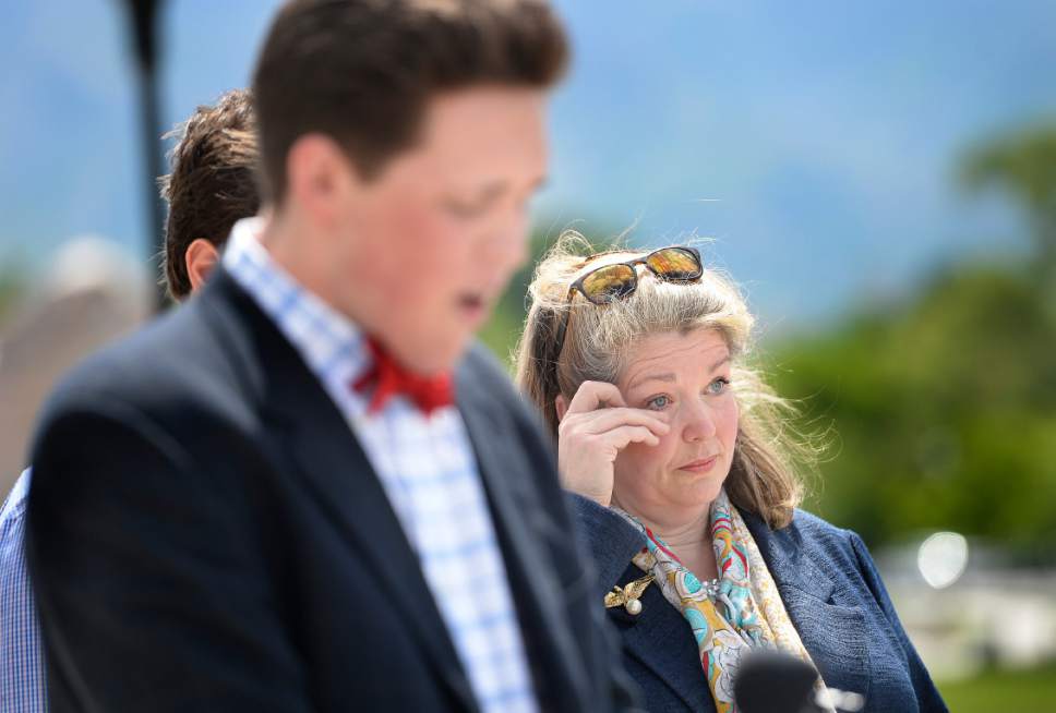 Scott Sommerdorf | The Salt Lake Tribune
Jacquelyn Orton, widow of former U.S. Rep. Bill Orton, dabs her eyes as her son Wes mentioned his father during his introductory speech prior to Jacquelyn Orton's announcement of her candidacy for the Legislature on the south side of the Utah Capitol, Wednesday, May 31, 2017. She will be running for the District 24 seat in the Utah House of Representatives.