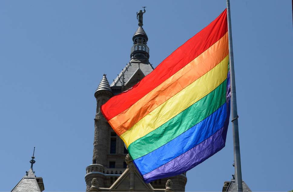Scott Sommerdorf  |  The Salt Lake Tribune
The Rainbow Flag that was raised by SLC Mayor Jackie Biskupski and Pride Exec. Director Carole Gnade, and others, flies on the east side of Salt Lake City Hall on Wednesday.