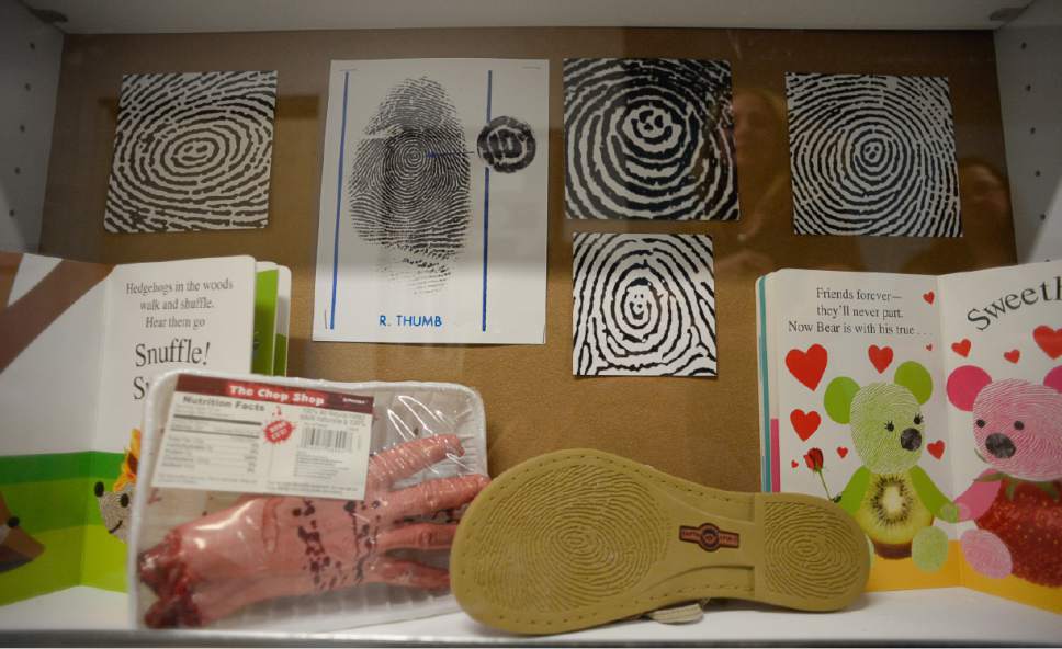 Francisco Kjolseth | The Salt Lake Tribune
Unique fingerprints that have been found on people are showcased at the new State Crime Lab in Taylorsville on Thursday, June 1, 2017.