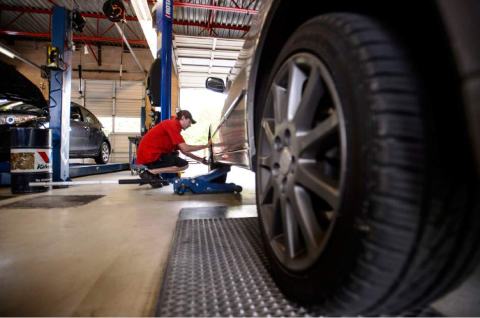 Steve Griffin  |  The Salt Lake Tribune



Bryce Carson performs a safety inspection a car at Speedway Emissions & Inspection in West Jordan Thursday June 1, 2017. A new law eliminating safety inspections has dedicated safety and emission testing sites nervous for their futures.