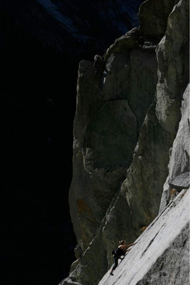 Francisco Kjolseth  |  The Salt Lake Tribune

Climbers soak in the sun on climbing routes in the Green Adjective Gulley area of Little Cottonwood Canyon on Monday, Dec. 1, 2008.