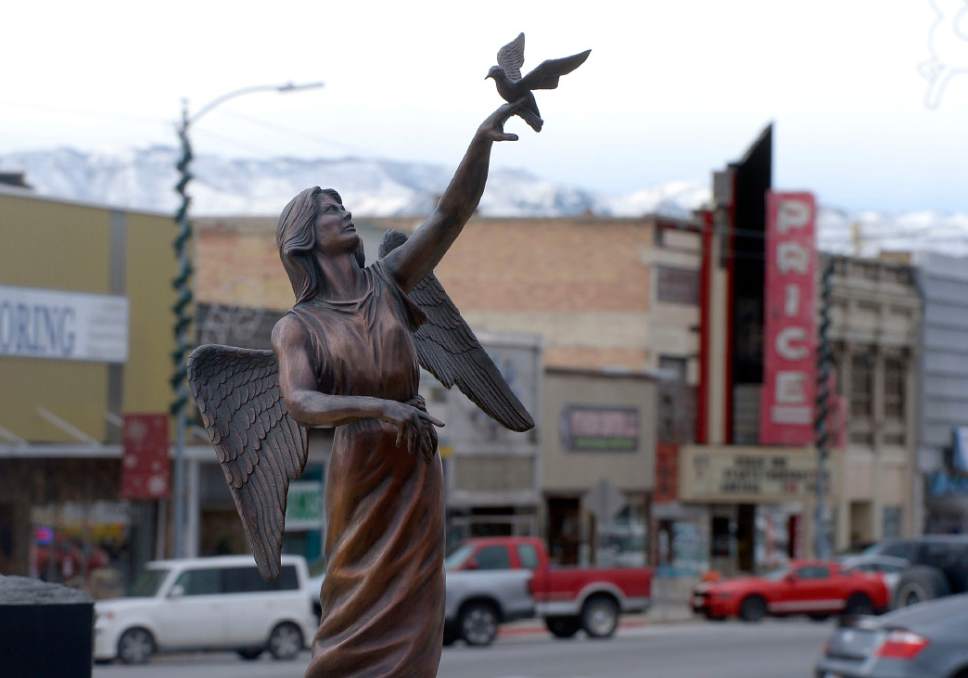 Al Hartmann  |  The Salt Lake Tribune
Angel and dove statue of the Coal Miner Memorial is placed prominently in the center of Price's Main street.   Businesses have suffered in the past few years with the closing of local mines and low demand for coal.  With the election of Donald Trump people in Carbon and Emery Counties breathed a sigh of relief and are hopeful that the coal industry can be saved.