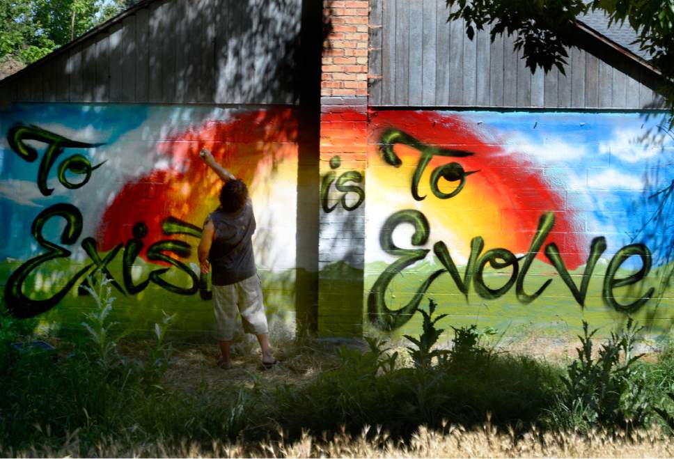 Scott Sommerdorf | The Salt Lake Tribune
At the entrance to the the Jordan Parkway Trail off California Ave., local artists with Justified Ink worked together with Glendale Middle School students to install panels of art, Friday, June 2, 2017.