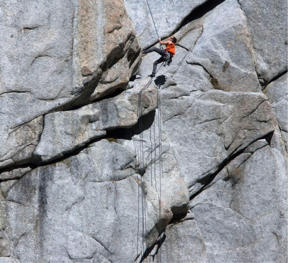 Steve Griffin  |  The Salt Lake Tribune

Rock climbers enjoy the warm temperatures as they climb the granite walls at the mouth of Little Cottonwood Canyon, Utah  Monday, March 5, 2012.