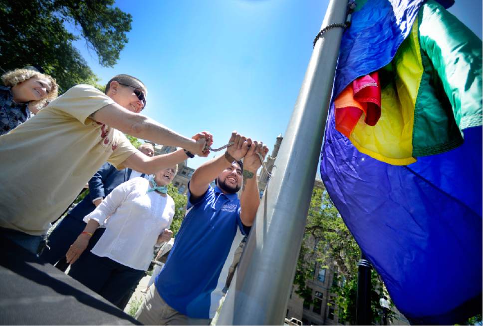 Scott Sommerdorf | The Salt Lake Tribune
The Ranbow Flag is raised by Utah Pride staff at the end of a press conference with Salt Lake City Mayor Jackie Biskupski and Pride Exec. Director Carole Gnade, Wednesday, May 31, 2017. They, along with Utah Senator Jim Dabakis, D-Salt Lake, announced plans for the Pride Festival which begins on Friday.