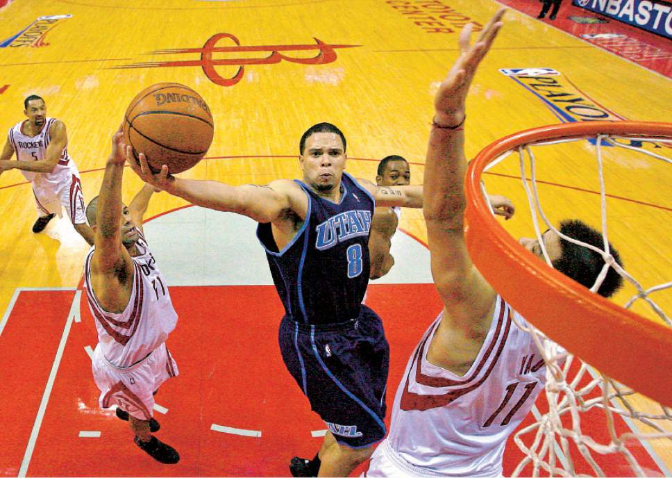 Chris Detrick  |  The Salt Lake Tribune

Deron Williams drives to the basket past Yao Ming during the 2007 playoffs.
