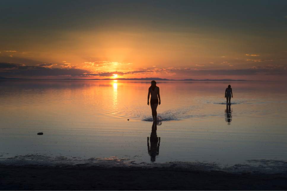 Rick Egan  |  Tribune file photo


Bas Tim, and Jes Downey, Greenville, NC, walk to the shore after floating in the Great Salt Lake on Antelope Island, Monday, September 15, 2014