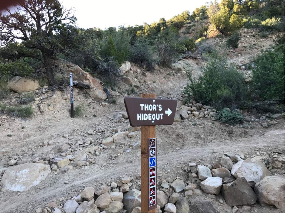 Nate Carlisle  |  The Salt Lake Tribune

A sign leads hikers onto the Thorís Hideout Trail near Cedar City on May 24, 2017.