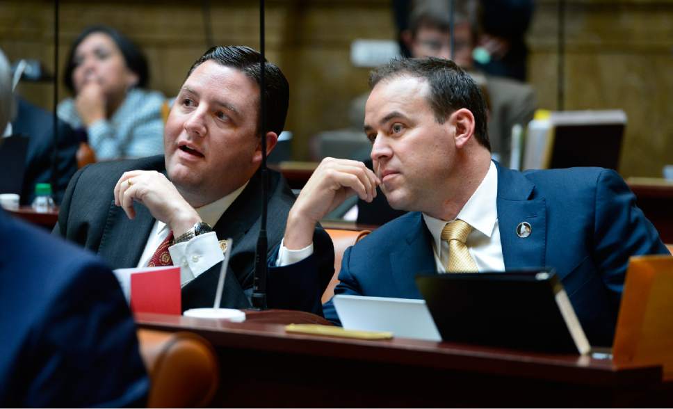 Scott Sommerdorf   | Tribune file photo
Rep. Mike Schultz, R-Hooper, right, in the Utah House of Representatives in 2015. Schultz lists 30 business he has ownership interests in.
