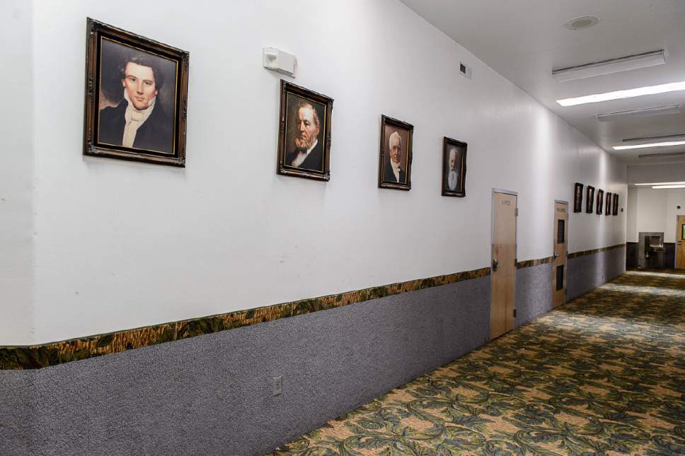 Trent Nelson  |  The Salt Lake Tribune
Portraits of Mormon prophets including Joseph Smith and Brigham Young line the hallway in an FLDS school in Colorado City, Ariz., one of a few sites being considered for use as an LDS meetinghouse. The property is owned by the UEP land trust, which is seeking to dispose of its holdings. Tuesday May 23, 2017.
