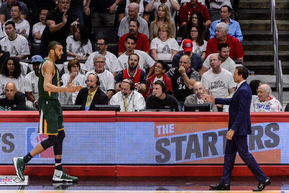 Trent Nelson  |  The Salt Lake Tribune
Utah Jazz center Rudy Gobert (27) leaves the game with his fourth foul, meeting Utah Jazz head coach Quin Snyder on the sideline, as the Utah Jazz face the Los Angeles Clippers in Game 7 at STAPLES Center in Los Angeles, California, Sunday April 30, 2017.