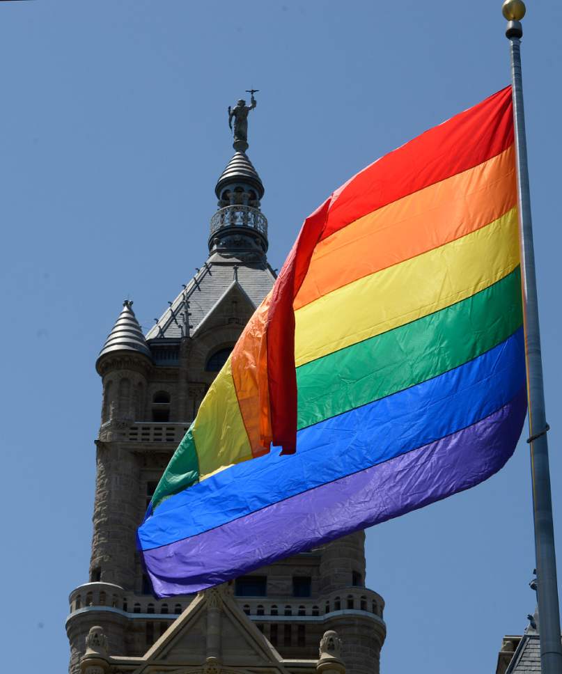 Scott Sommerdorf | The Salt Lake Tribune
The Rainbow Flag that was raised by SLC Mayor Jackie Biskupski and Pride Exec. Director Carole Gnade, and others, flies on the east side of Salt Lake City Hall, Wednesday, May 31, 2017.