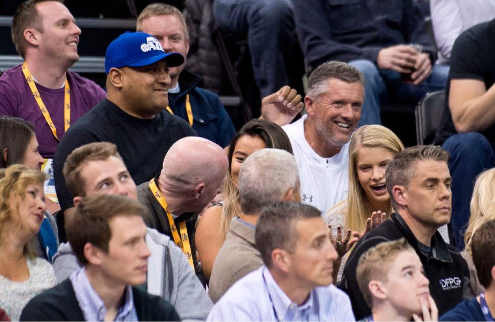 Lennie Mahler  |  The Salt Lake Tribune

BYU head football coach Kilane Sitake and Utah head football coach Kyle Whittingham sit together in the first half of a basketball game between the Utah Jazz and the LA Clippers at Vivint Smart Home Arena, Monday, Feb. 13, 2017.