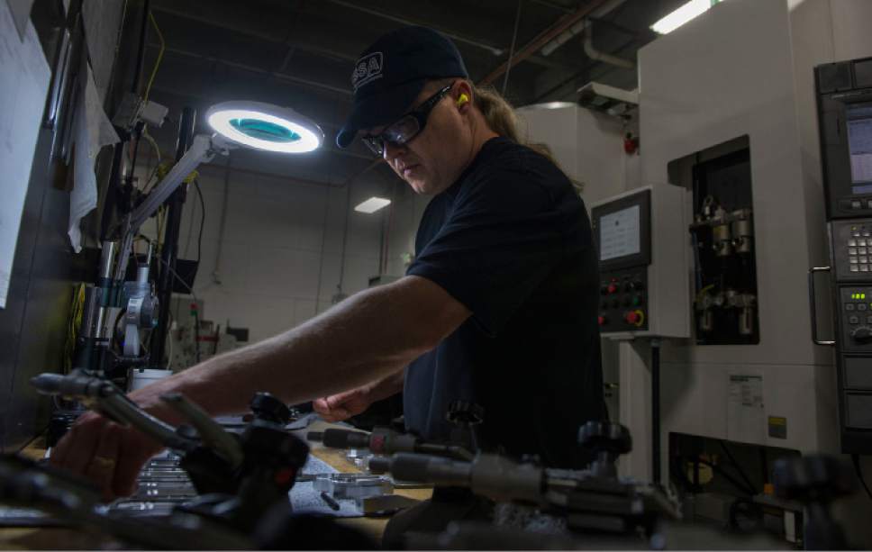 Leah Hogsten  |  The Salt Lake Tribune
Silencerco machinist Gordon Wellington manufactures baffles for one of the company's silencers.  Silencerco is one of the country's largest manufacturers of silencer for guns of all kinds, Friday, May 28, 2017.