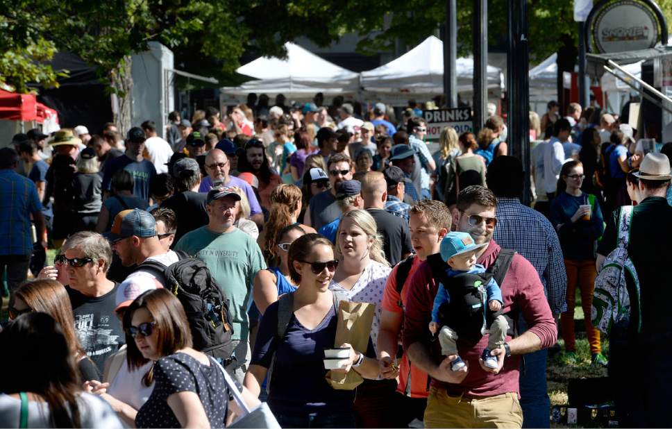Scott Sommerdorf | The Salt Lake Tribune
The crowded walkways full of kids, dogs and shoppers at the opening day of the Salt Lake City Farmer's Market, Saturday, June 10, 2017.