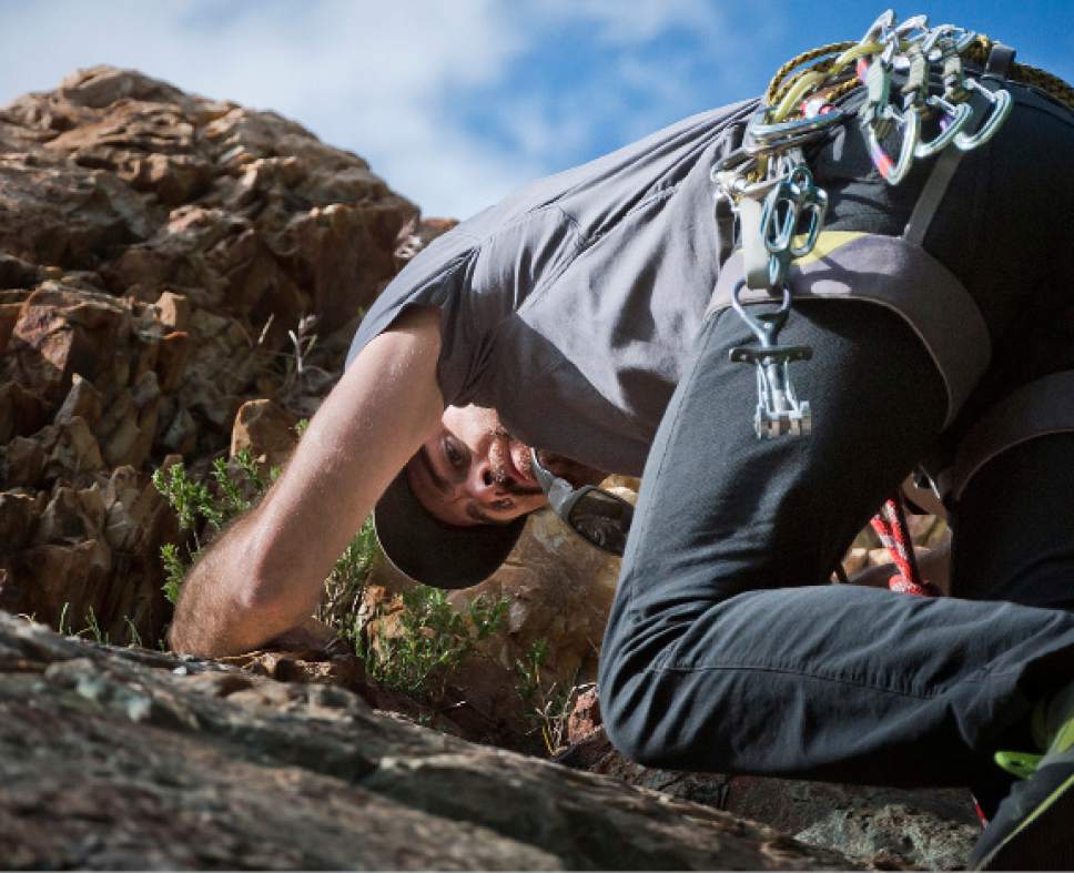 Michael Mangum  |  Special to the Tribune


Nick Musso, one of the organizers of Operation Climb On, scales a rock wall to set a climbing rope in Big Cottonwood Canyon on Saturday.