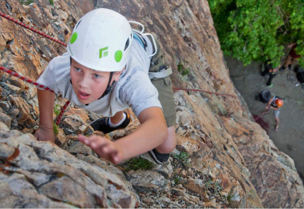 Michael Mangum  |  Special to The Tribune


Scott Person, 11, of Midvale, climbs a line Saturday in Big Cottonwood Canyon with Army veteran Geoff Bippes belaying from below. Operation Climb On focuses on engaging veterans in the outdoors and hosts climbing events once a month.