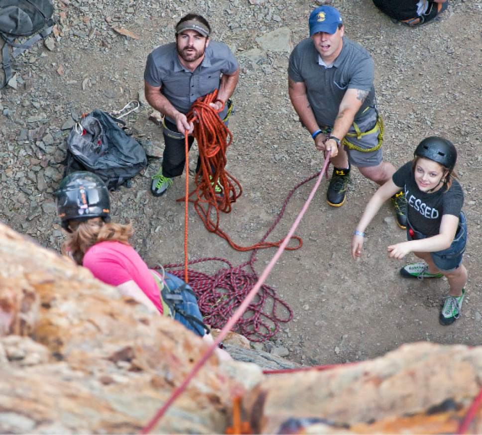 Michael Mangum  |  Special to The Tribune


United States Marine Corps veteran and Operation Climb On founder Michael Cumming, top right, belays a climber Saturday in Big Cottonwood Canyon. Nick Musso, one of Operation Climb On's organizers, top left, and Ireland Johnston, far right, watch on.
