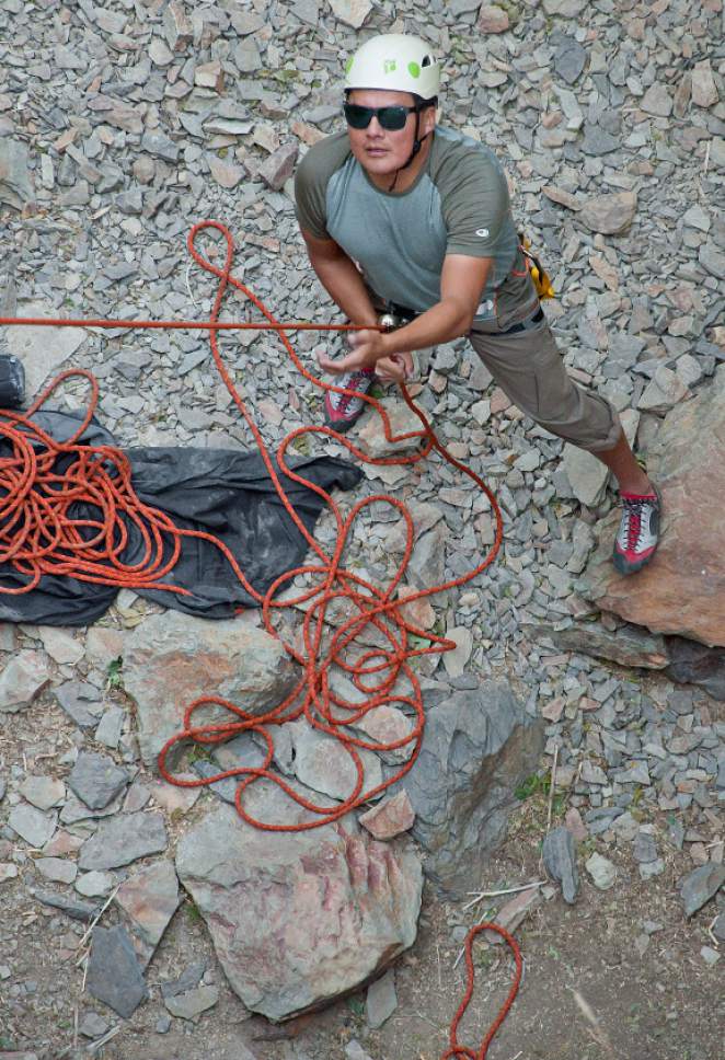 Michael Mangum  |  Special to The Tribune


United States Marine Corps veteran Warren Young belays a climber Saturday in Big Cottonwood Canyon during an event organized by Operation Climb On.