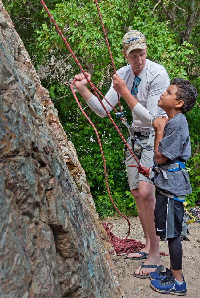 Michael Mangum  |  Special to the Tribune


Army veteran Geoff Bippes readies his nephew Dray Urry, 10 years old from Riverton, to rock climb in Big Cottonwood Canyon during an event organized by Operation Climb On on Saturday, June 10, 2017.