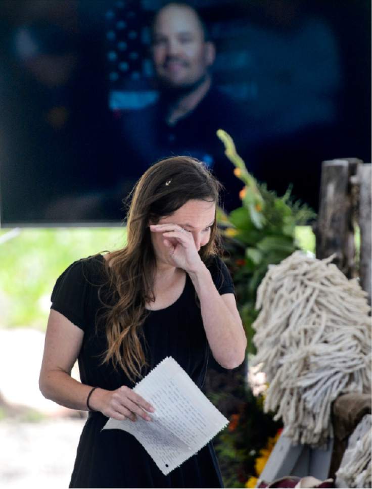 Steve Griffin  |  The Salt Lake Tribune


Tristan Gale Geisler, 2002 Olympic Skeleton Gold Medalist, wipes tears from her eyes after speaking about her long-time friend Steve Holcomb as Park City and the Holcomb family and friends hold a memorial to honor the late 37-year-old Park City gold medalist bobsledder who passed away suddenly in Lake Placid last month. The remembrance was held in the summer pavilion at Utah Olympic Park Park City. Saturday, June 10, 2017.