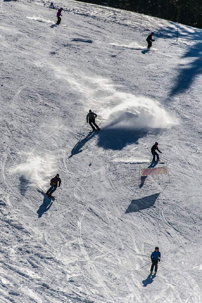 Trent Nelson  |  The Salt Lake Tribune
Skiers on opening day at Brighton Ski Resort, Utah, Friday, November 25, 2016. With heavy snowfall, the state's 14 resorts attracted 4,584,658 skier days in the 2016-17 season. That eclipsed the previous record (4,457,575 skier days), which stood for only a year, by 2.9 percent. A skier day is counted each time a person buys a daily lift ticket or uses a season's pass.