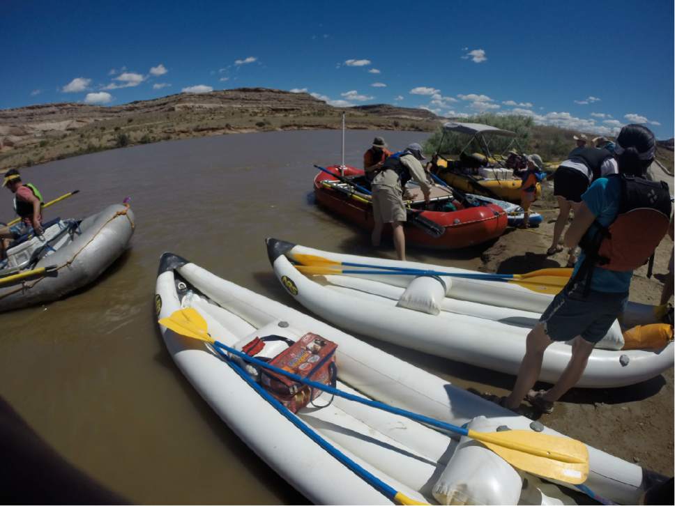 Nate Carlisle  |  The Salt Lake Tribune


River runners launch rafts and inflatable kayaks onto the Colorado River at Dewey Bridge campground near Moab on May 27, 2017.