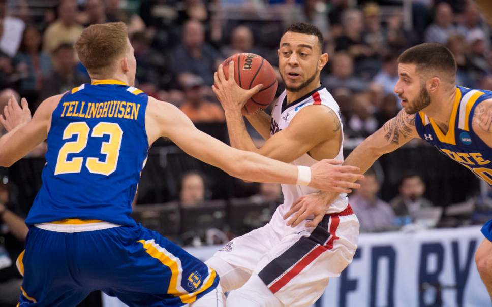 Chris Detrick  |  The Salt Lake Tribune

Gonzaga Bulldogs guard Nigel Williams-Goss (5) is defended by South Dakota State Jackrabbits guard Reed Tellinghuisen (23) and South Dakota State Jackrabbits guard Michael Orris (50) during first round of the NCAA Tournament in Salt Lake City on Thursday, March 16, 2017.