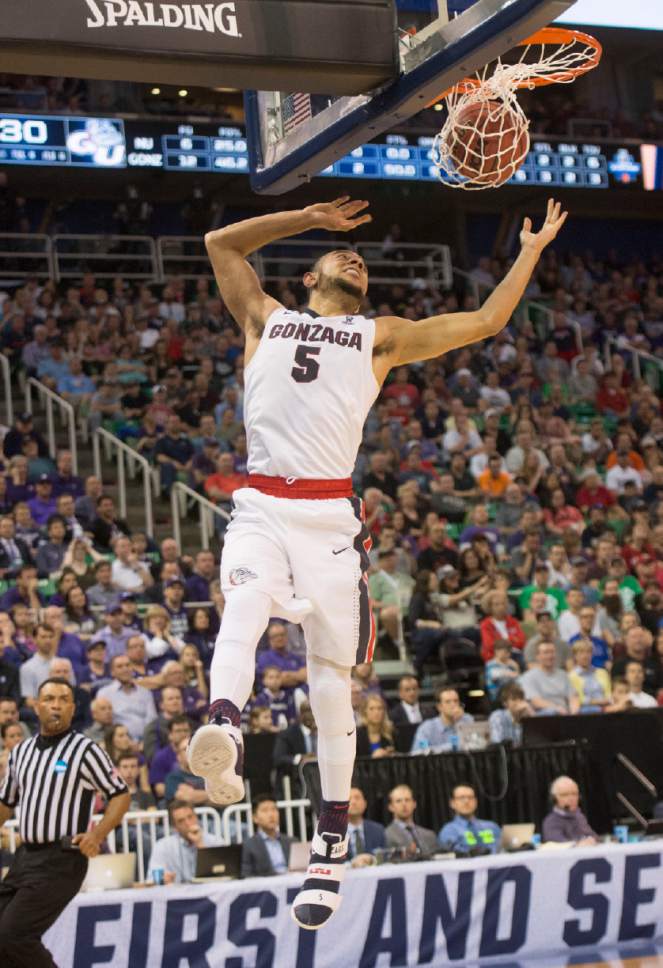 Chris Detrick  |  The Salt Lake Tribune

Gonzaga Bulldogs guard Nigel Williams-Goss (5) dunks the ball against Northwestern as the teams face off in the NCAA tournament in Salt Lake City on Saturday, March 18, 2017.