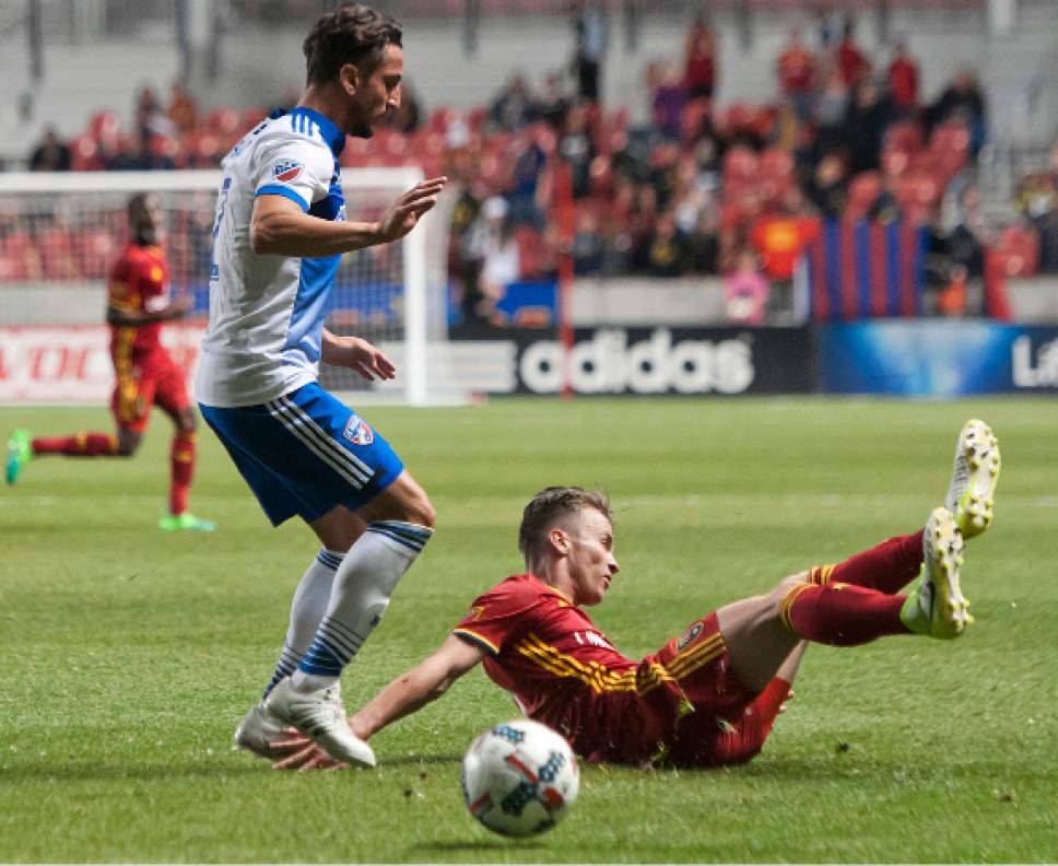 Michael Mangum  |  Special to the Tribune

Real Salt Lake midfielder Albert Rusnak (11) slides in front of FC Dallas defender Hernan Grana (2) during their match at Rio Tinto Stadium in Sandy, UT on Saturday, May 6, 2017.