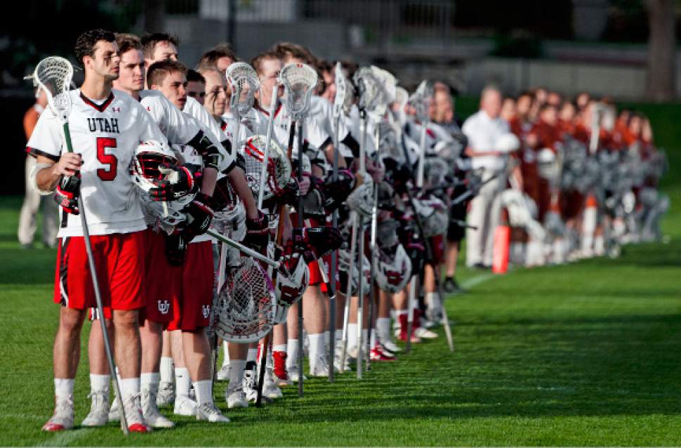 Michael Mangum  |  Special to the Tribune

The Utah Utes and Texas Longhorns men's lacrosse teams line up during the playing of the national anthem before their game at Ute Soccer Field in Salt Lake City on Thursday, April 13, 2017.