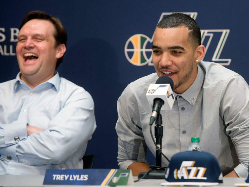 Steve Griffin  |  The Salt Lake Tribune


Utah Jazz rookie Trey Lyles answers questions from the media as Jazz general manager Dennis Lindsey laughs in the background during a press conference introducing the two new Jazz draft picks at the Zions Bank Basketball Center in Salt Lake City, Friday, June 26, 2015.