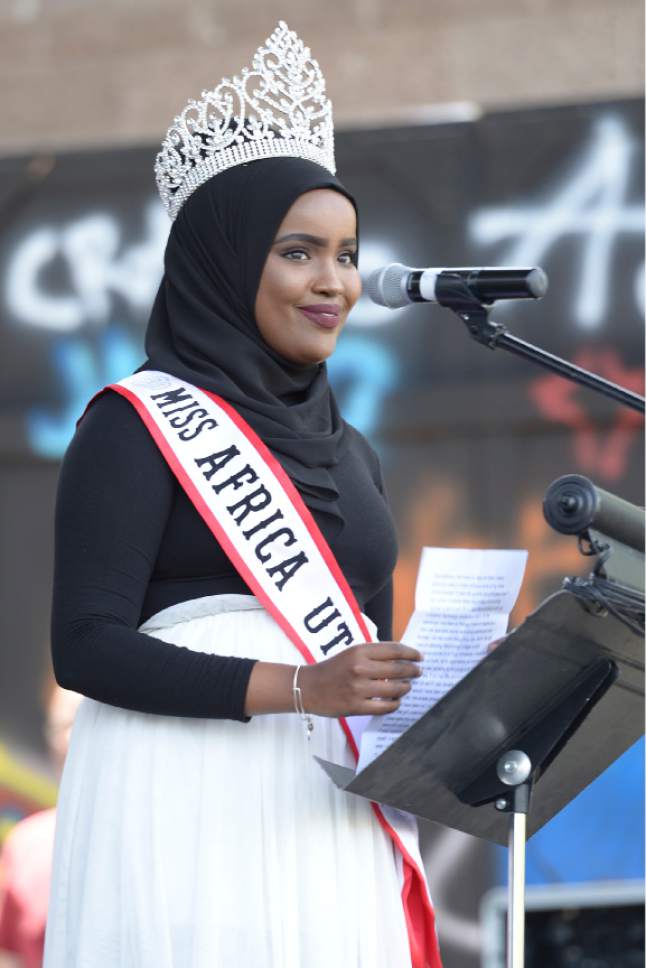 Leah Hogsten  |  The Salt Lake Tribune
"Three years ago, it was my mission to reclaim my identity and to be proud of who I was becoming," said Asthma Ali Dahir, 18, who was crowned Miss Africa Utah. Dahir is a surgical technology student at Salt Lake Community College and is headed to Westminster on a full scholarship to study neuroscience pre-Med this fall. "Allow me to be one of the role models I never had," Dahir told the crowd of youth at the 28th Annual Juneteenth Freedom and Heritage Festival, Saturday, June 18, 2017 at the Utah Cultural Celebration Center. Juneteenth celebrates the end of slavery in the United States.