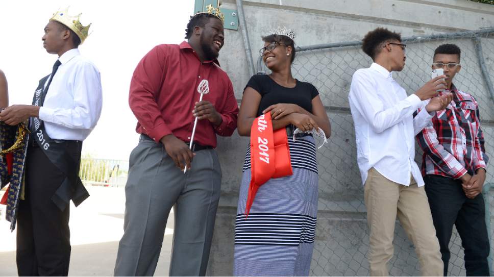 Leah Hogsten  |  The Salt Lake Tribune
Drake Bratton, left, Mar'Kiece Gross, Zaire Steward Phillip Petty and Micah Petty were all honored for their service as former and current Juneteenth royalty and standouts at the 28th Annual Juneteenth Freedom and Heritage Festival on Saturday at the Utah Cultural Celebration Center. Juneteenth celebrates the end of slavery in the United States.