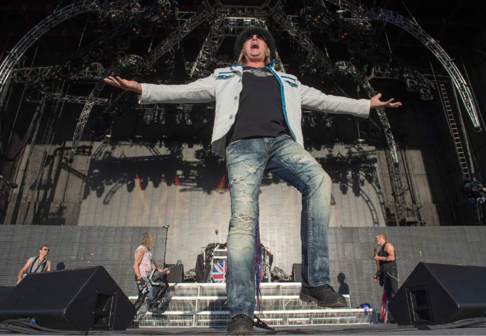 Rick Egan  |  The Salt Lake Tribune

Joe Elliott sings for Def Leppard as they play USANA Amphitheatre, Monday, June 23, 2014.
