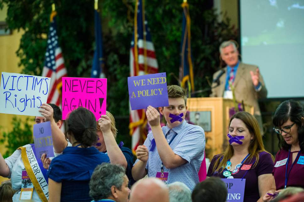 Chris Detrick  |  The Salt Lake Tribune


Protestors hold up signs and demonstrate as Chairman Peter Corroon speaks during the Utah State Democratic Party 2017 State Organizing Convention at Weber State University Shepard Union Saturday, June 17, 2017. They were protesting against the Democratic Party's response to the allegations against Rob Miller.
