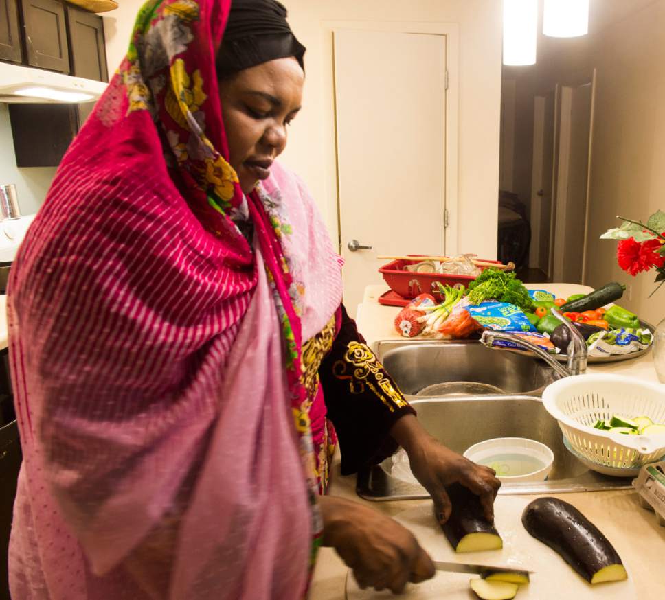 Rick Egan  |  The Salt Lake Tribune

Kaltum Mohamed chops fresh vegetables as she prepares food from her native Sudan in her South Salt Lake apartment Monday, April 24, 2017.